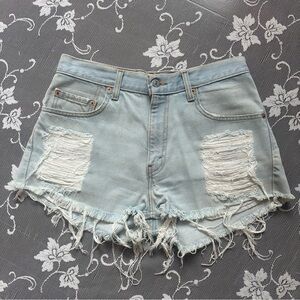 Vintage Levi’s 505 Light Wash Distressed Denim Shorts